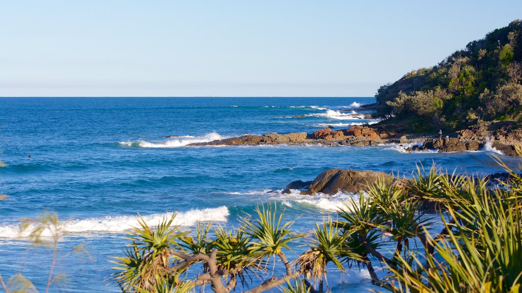 Coolum Beach showing rocky coastline