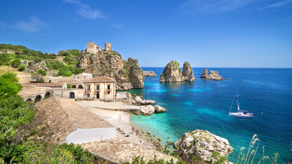 San Vito Lo Capo showing rocky coastline, sailing and general coastal views