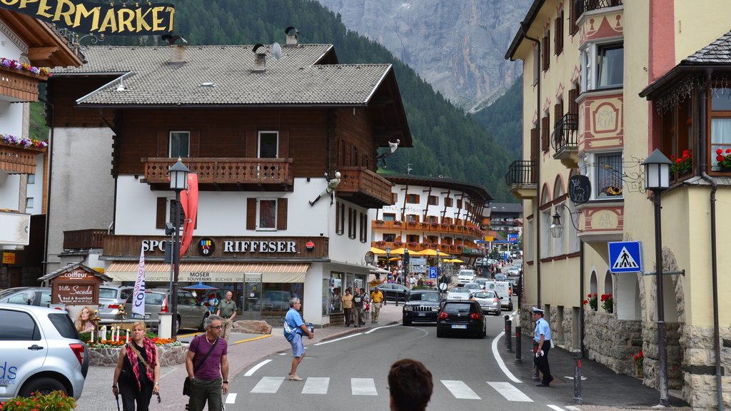 Selva di Val Gardena which includes a small town or village, signage and street scenes