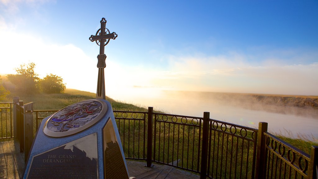 Dieppe featuring religious elements and mist or fog