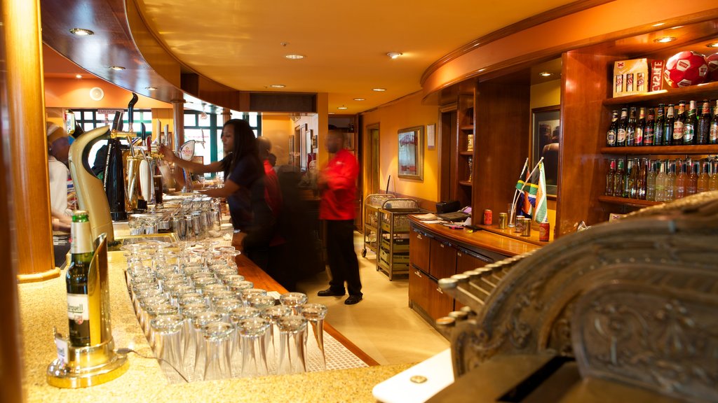 SAB World of Beer showing a bar and interior views as well as a small group of people