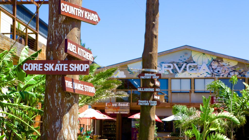 Dolphin Beach showing signage