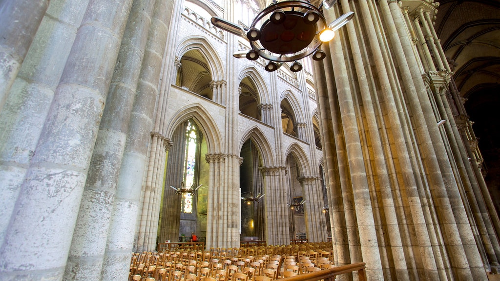 Rouen Cathedral featuring interior views and a church or cathedral