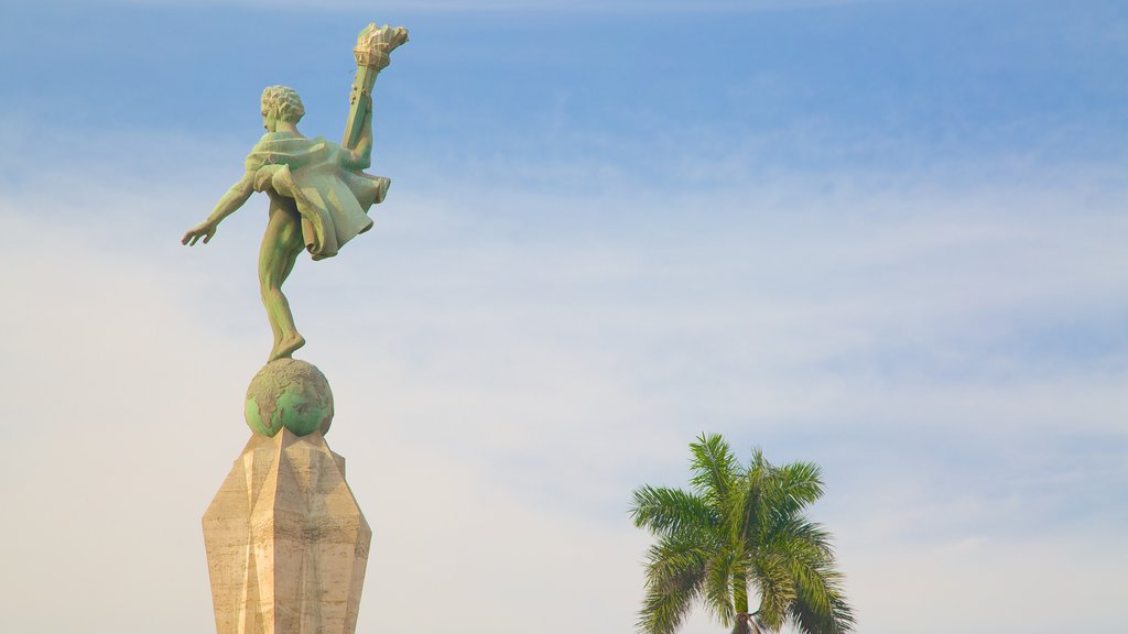 Trujillo Plaza de Armas featuring a statue or sculpture