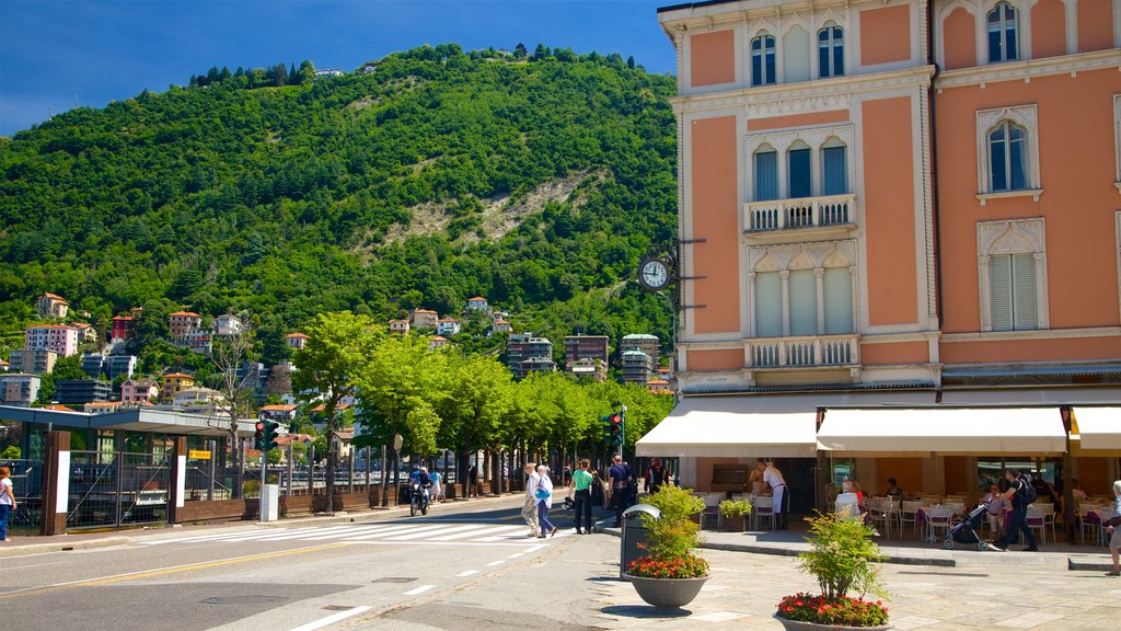 Piazza Cavour which includes a square or plaza, a small town or village and heritage architecture