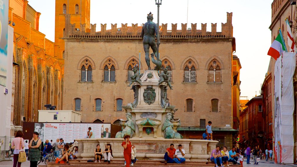 Fonte de Netuno que inclui uma praça ou plaza, uma fonte e uma estátua ou escultura