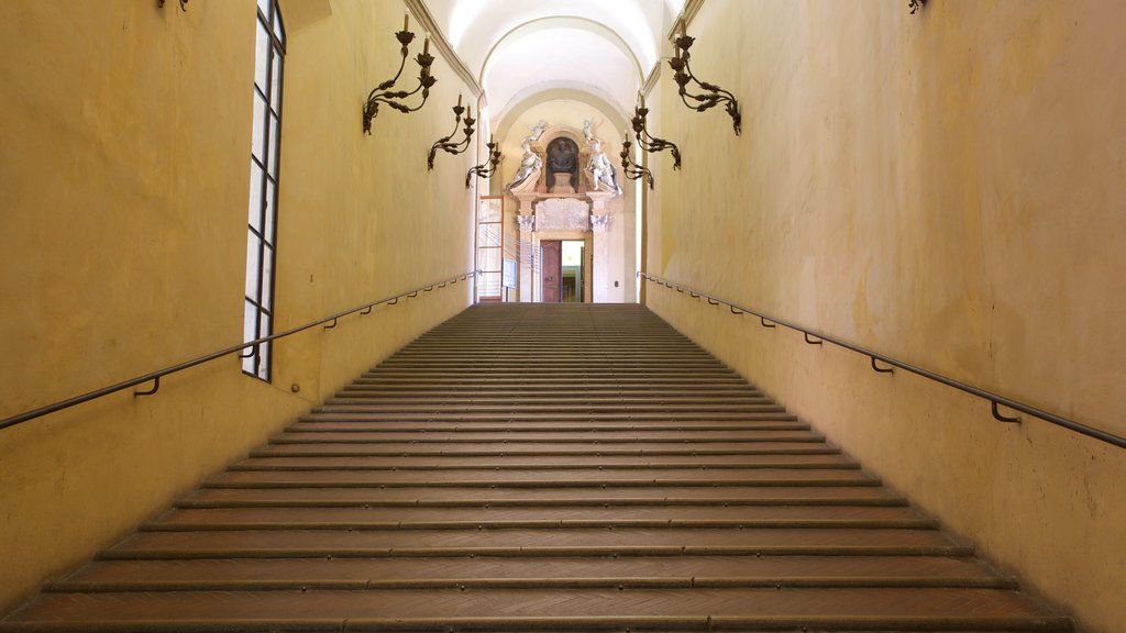 Palazzo Comunale featuring heritage elements, a castle and interior views