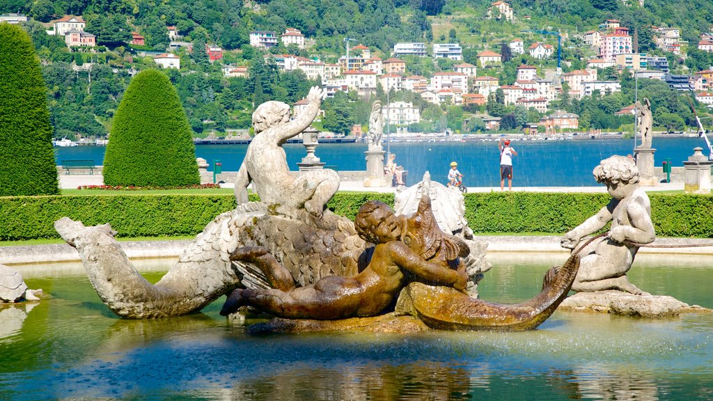 Villa Olmo showing a fountain, a statue or sculpture and a coastal town