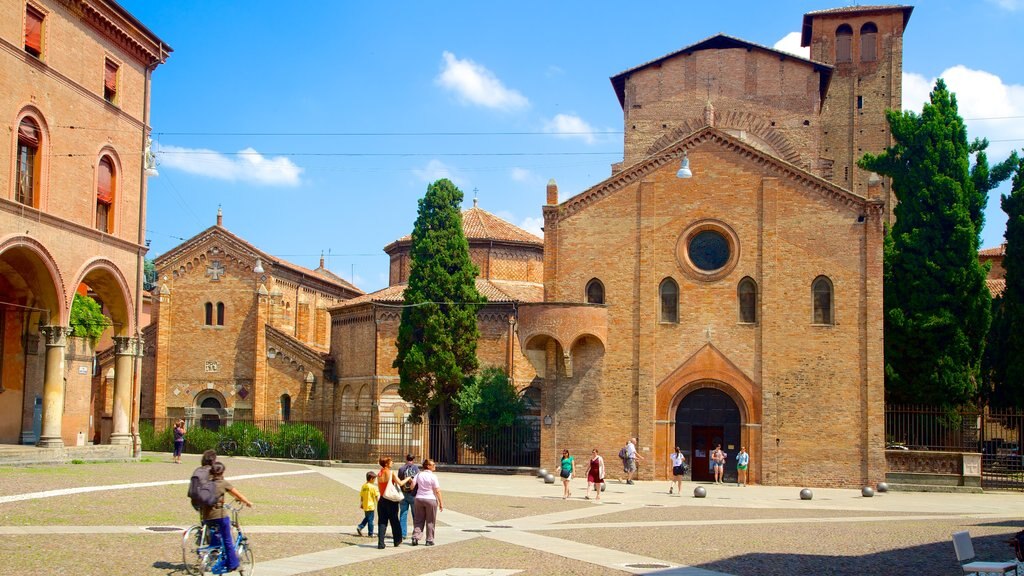 Basilica Santo Stefano which includes religious elements, heritage architecture and a square or plaza