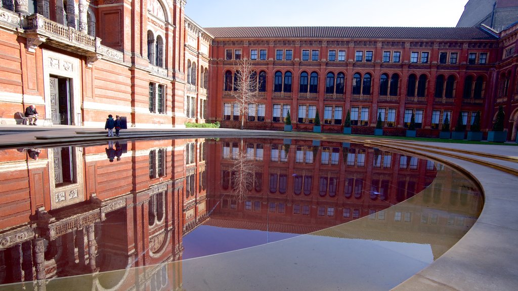 Victoria and Albert Museum showing a square or plaza and a fountain