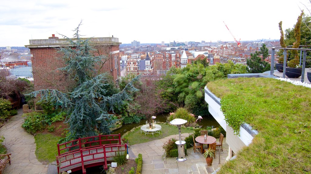 Kensington Roof Gardens featuring a park