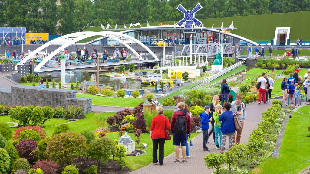 Madurodam showing a park as well as a small group of people