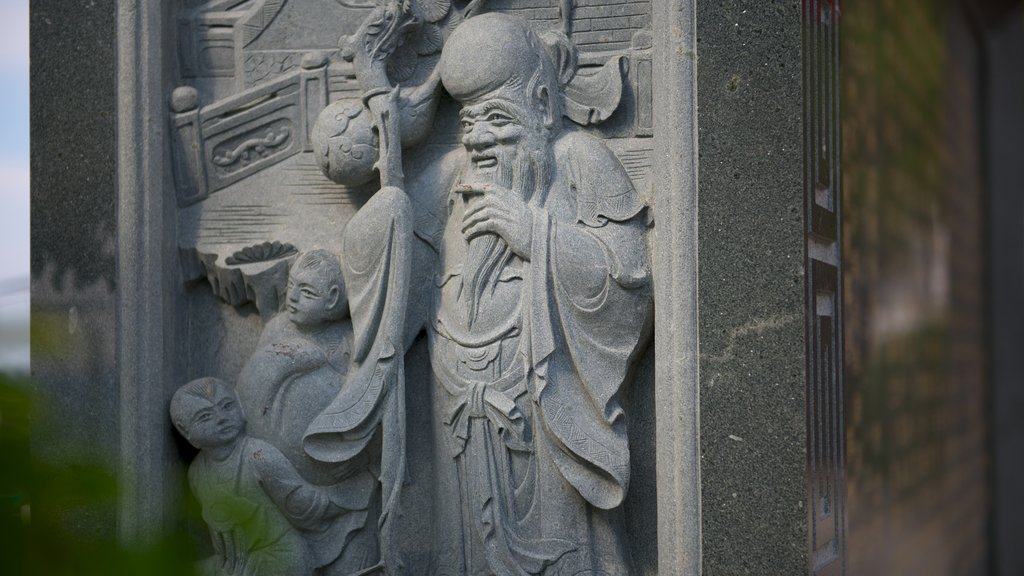 Wen Wu Chao showing a statue or sculpture and heritage elements