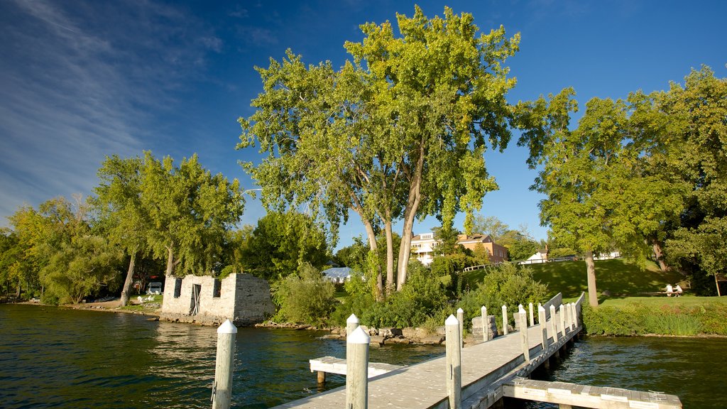 Aurora which includes a lake or waterhole and a garden