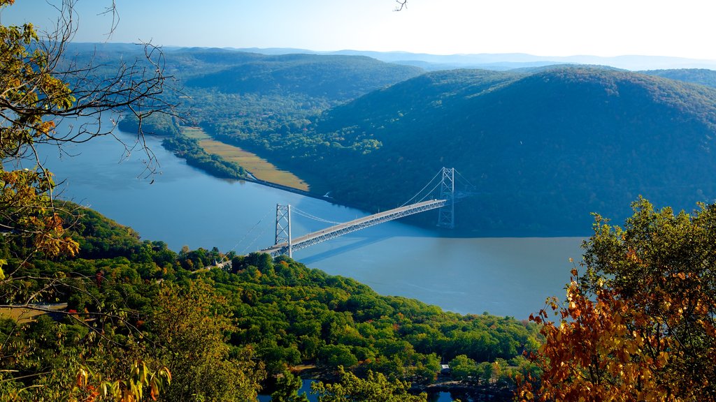 Bear Mountain State Park featuring a river or creek, a bridge and tranquil scenes