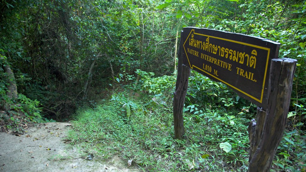 Erawan National Park which includes signage and hiking or walking