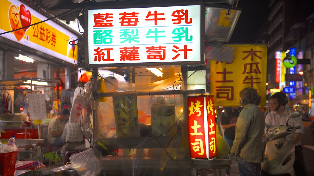 Mercado nocturno Zhonghua mostrando escenas de noche y mercados