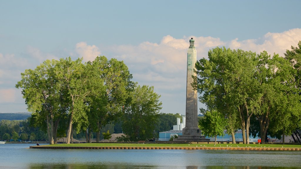 Erie which includes a monument, a garden and a lake or waterhole