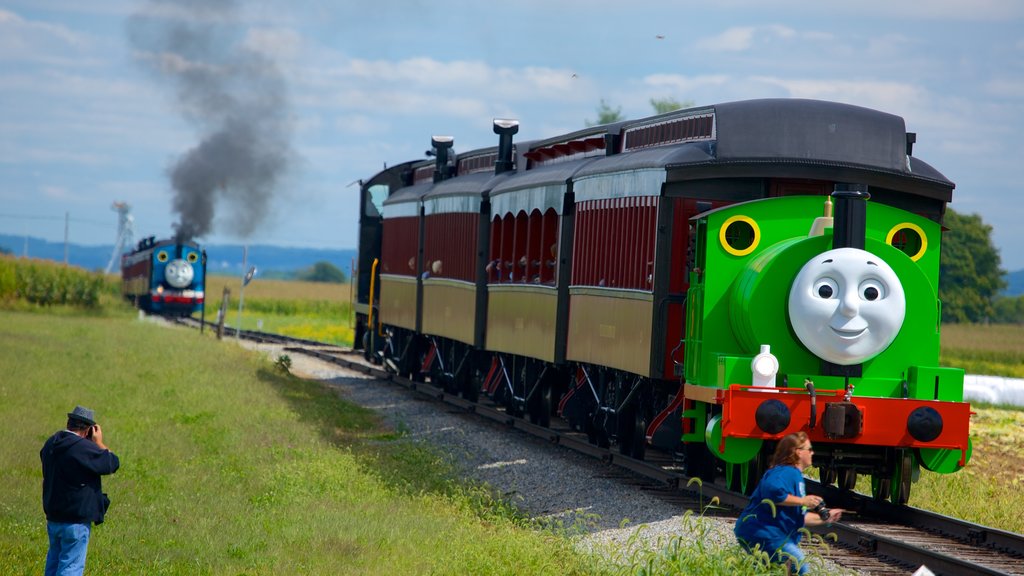 National Toy Train Museum mettant en vedette éléments ferroviaires aussi bien que une femme seule