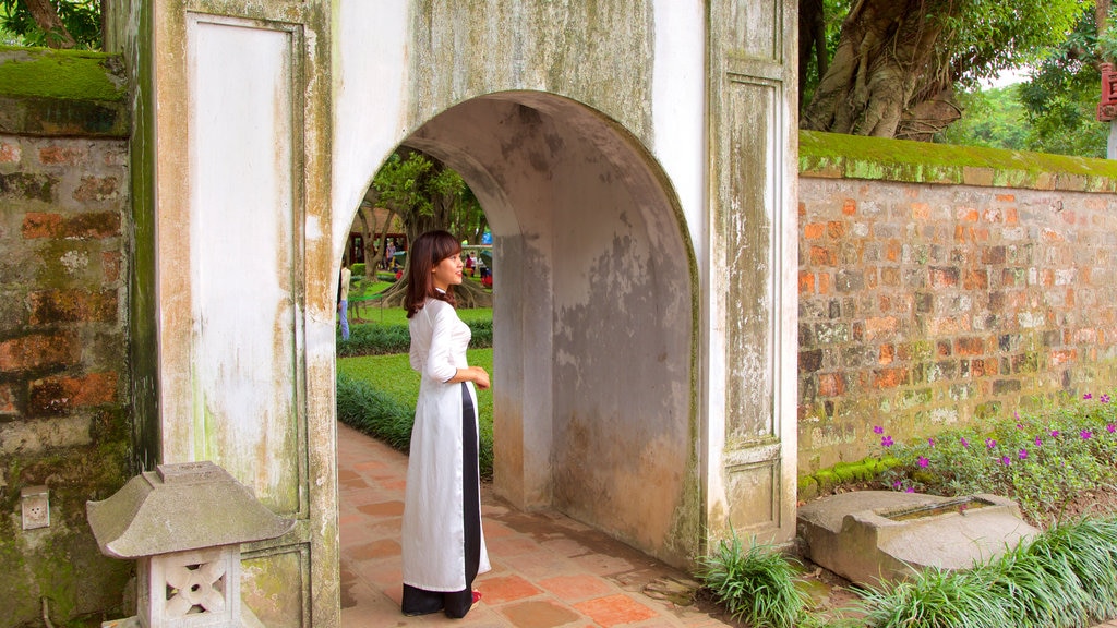 Temple of Literature featuring a temple or place of worship as well as an individual female