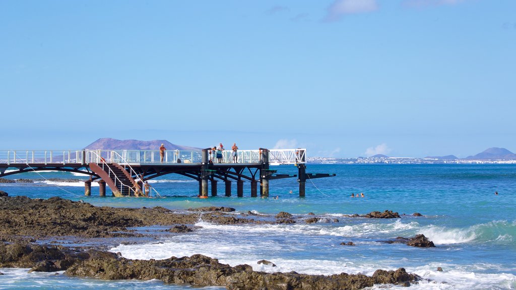 Corralejo which includes views, rocky coastline and general coastal views