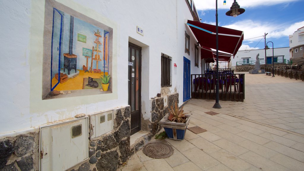 El Cotillo que incluye una pequeña ciudad o aldea