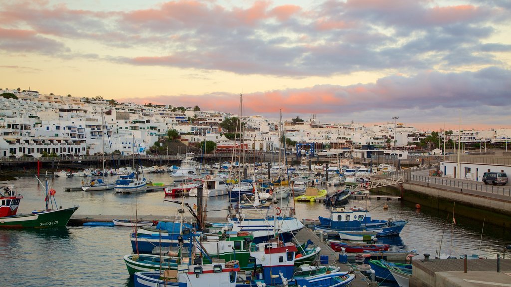 Puerto del Carmen showing boating, a coastal town and a bay or harbour