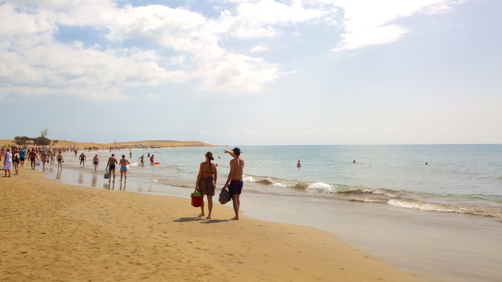 Meloneras que inclui paisagens litorâneas e uma praia