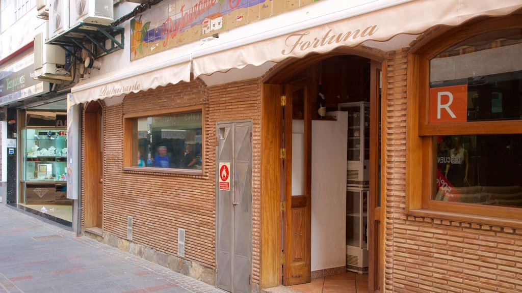 Los Cristianos which includes shopping and signage