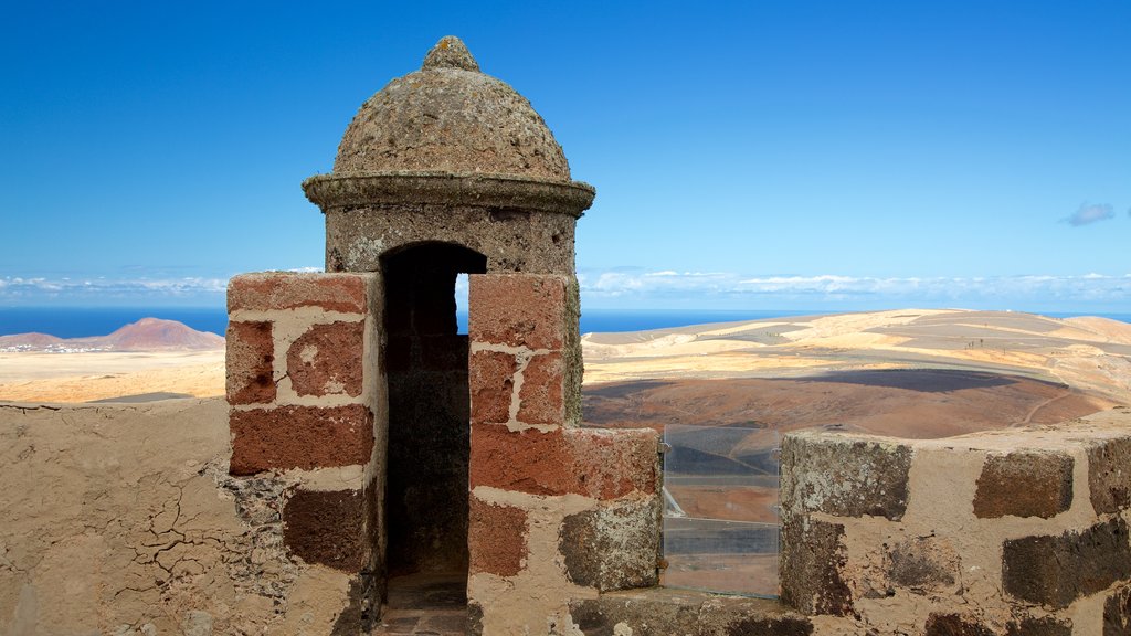 Santa Barbara Castle which includes a castle and desert views