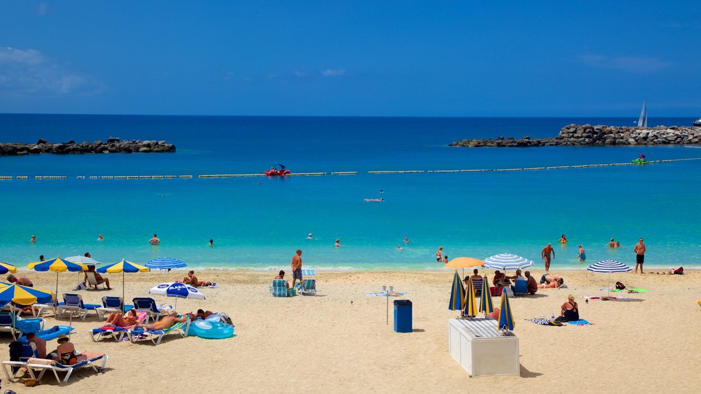 Amadores Beach featuring a sandy beach, general coastal views and swimming