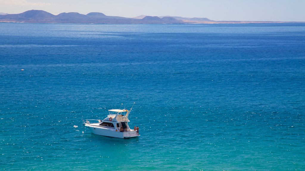 Papagayo Beach which includes boating and general coastal views