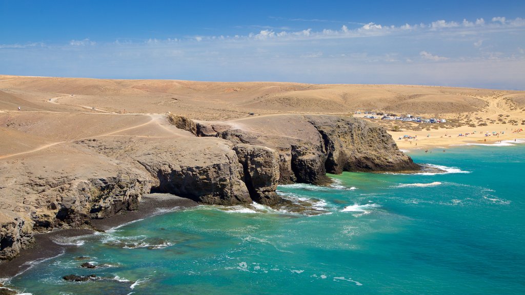 Papagayo Beach featuring rugged coastline, general coastal views and tranquil scenes