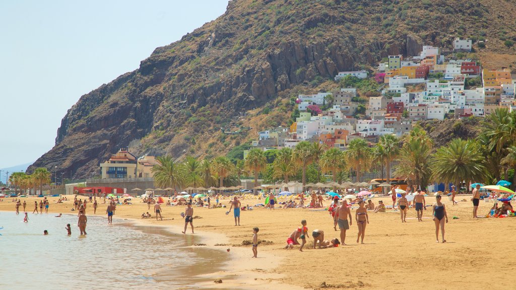 Teresitas Beach featuring a coastal town, a sandy beach and general coastal views