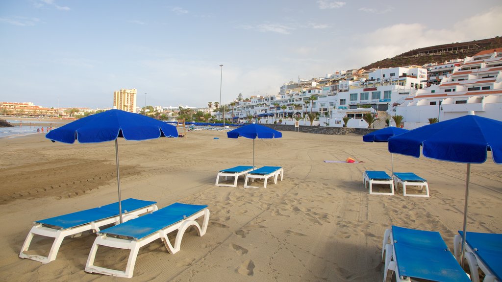 Las Vistas Beach showing a sandy beach and a coastal town