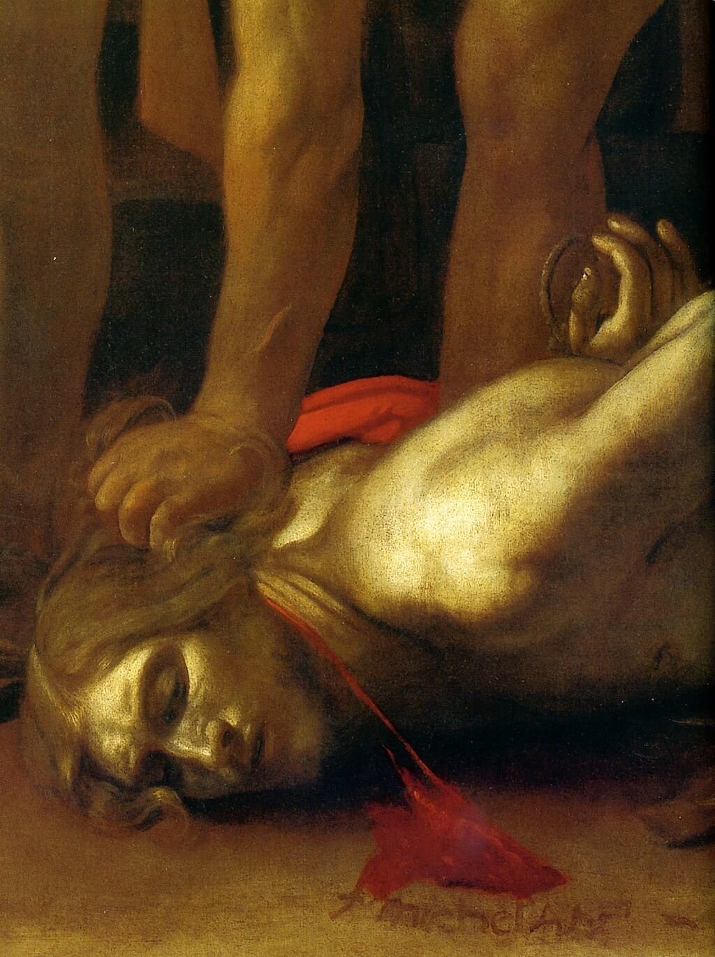 La Decollazione di San Giovanni Battista, particolare in cui si nota, in basso, la firma del Caravaggio.