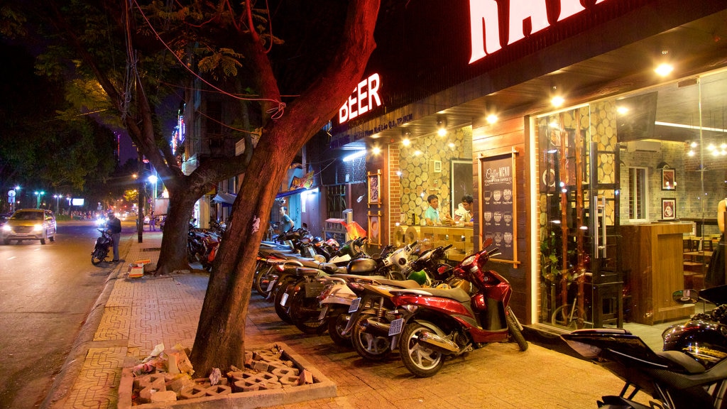 Pham Ngu Lao Street showing night scenes and a city