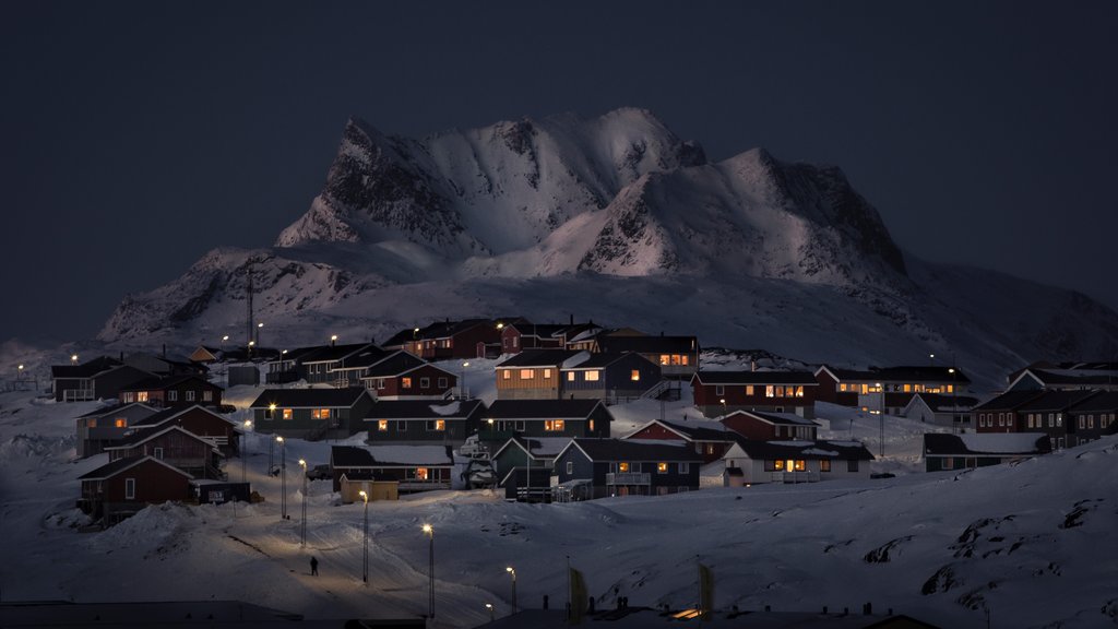 Nuuk showing mountains, a small town or village and snow