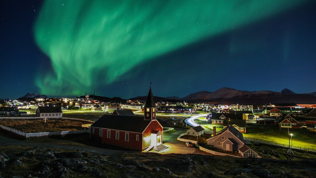 Nuuk which includes northern lights, night scenes and a city