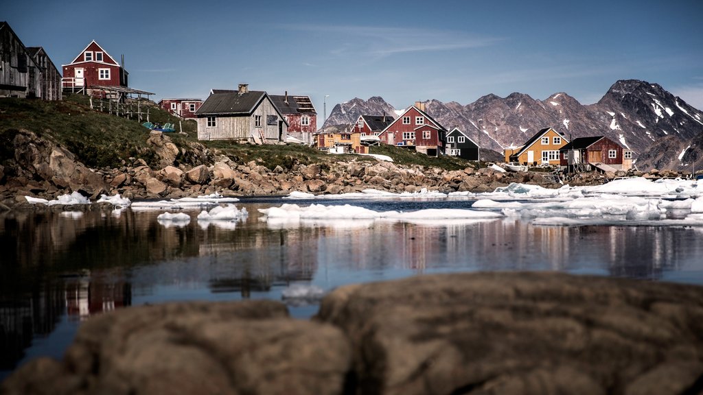 Kulusuk featuring a lake or waterhole, snow and a small town or village