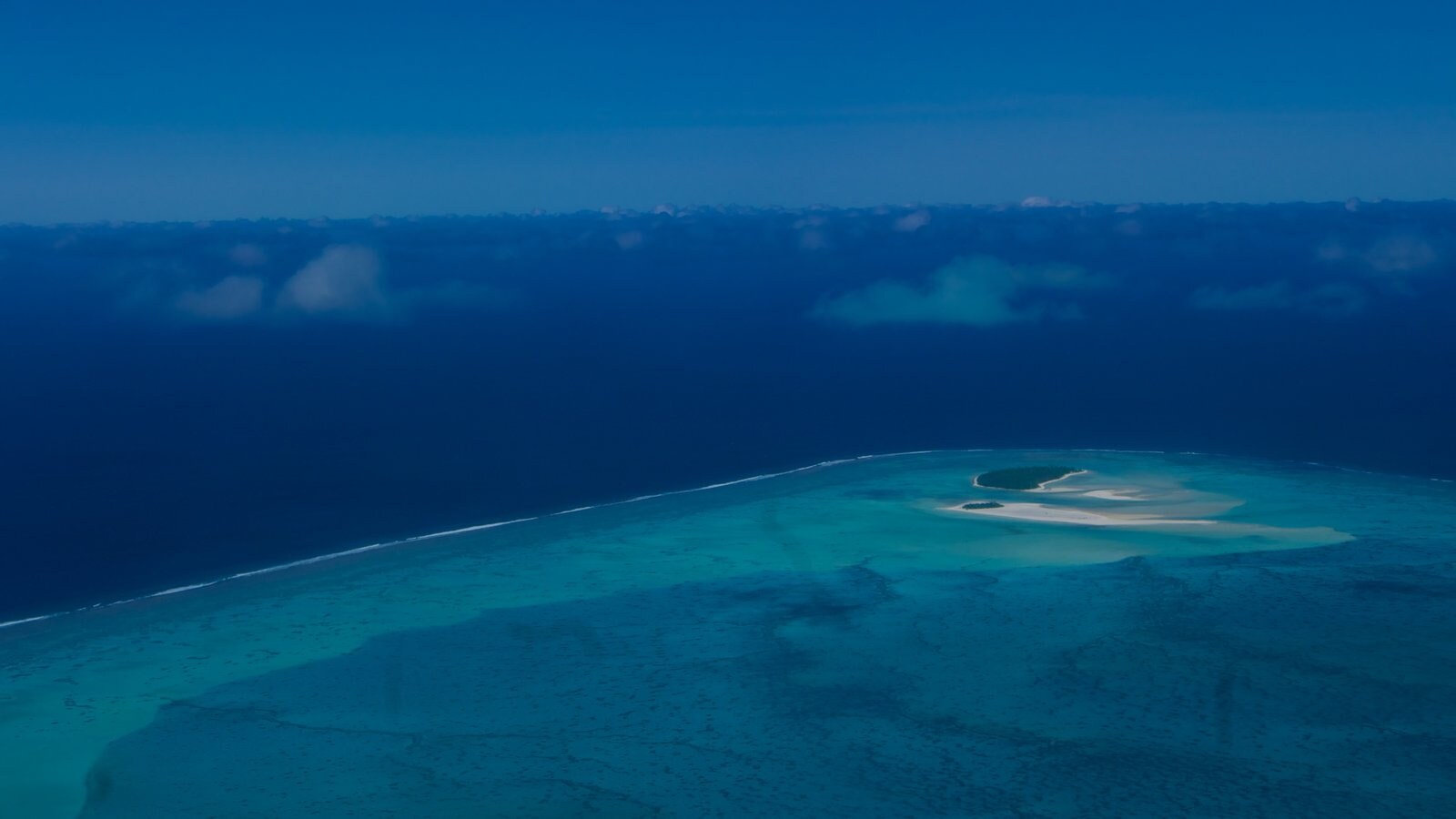 Aitutaki which includes general coastal views