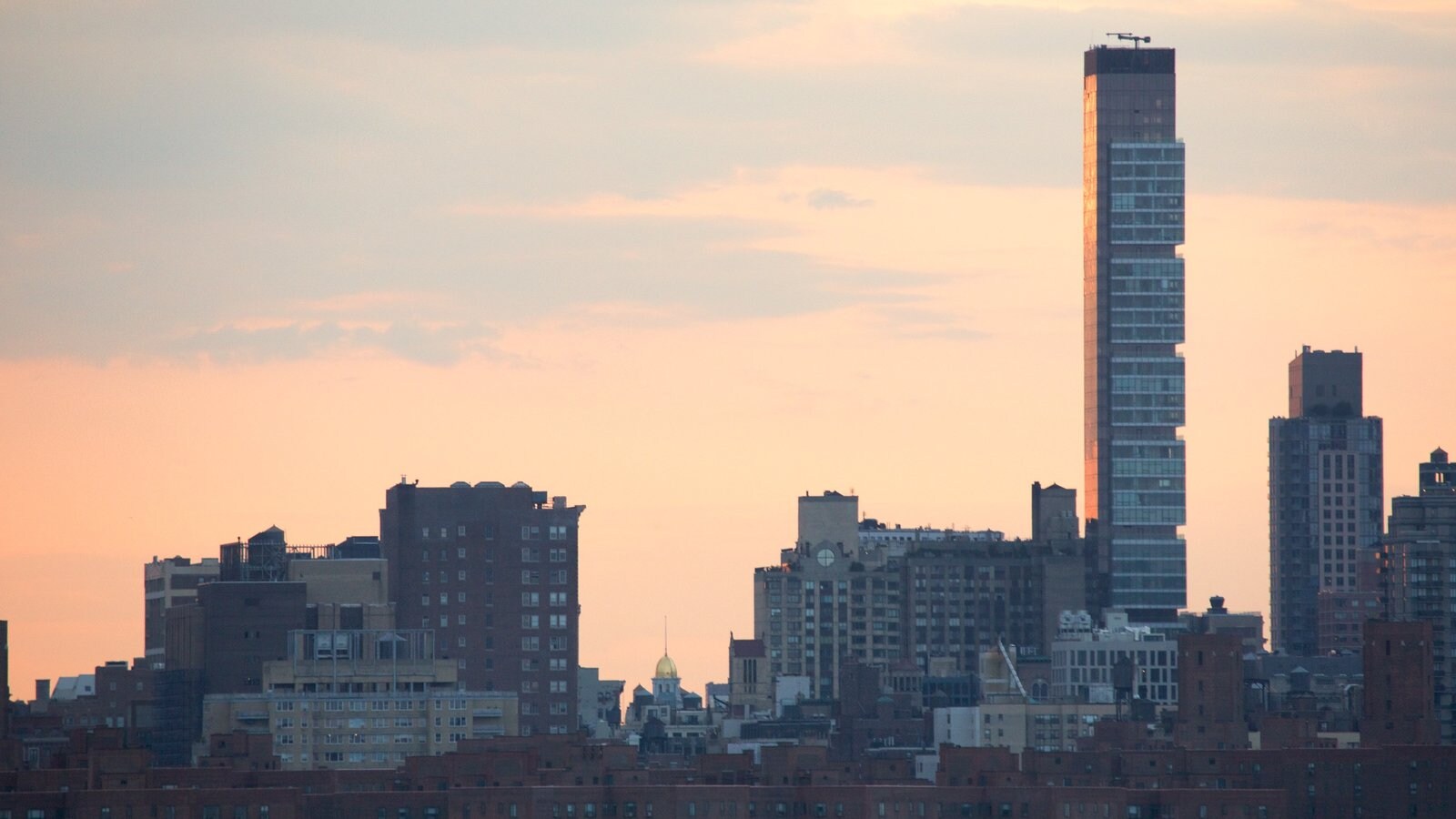 Brooklyn which includes a skyscraper, a sunset and a city