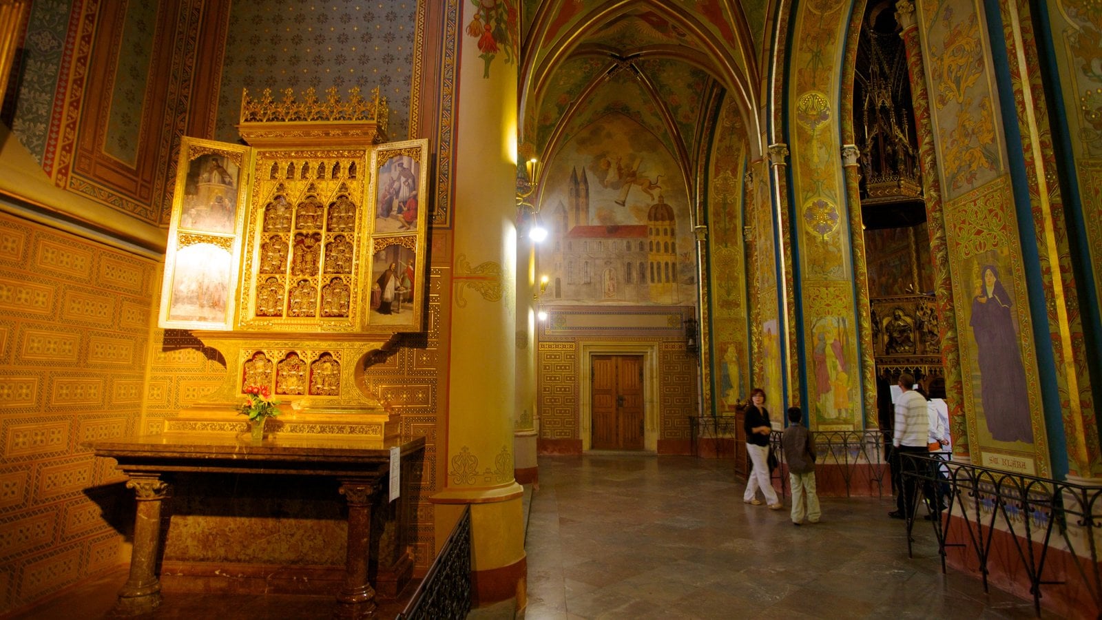 Prague which includes a church or cathedral, religious elements and interior views