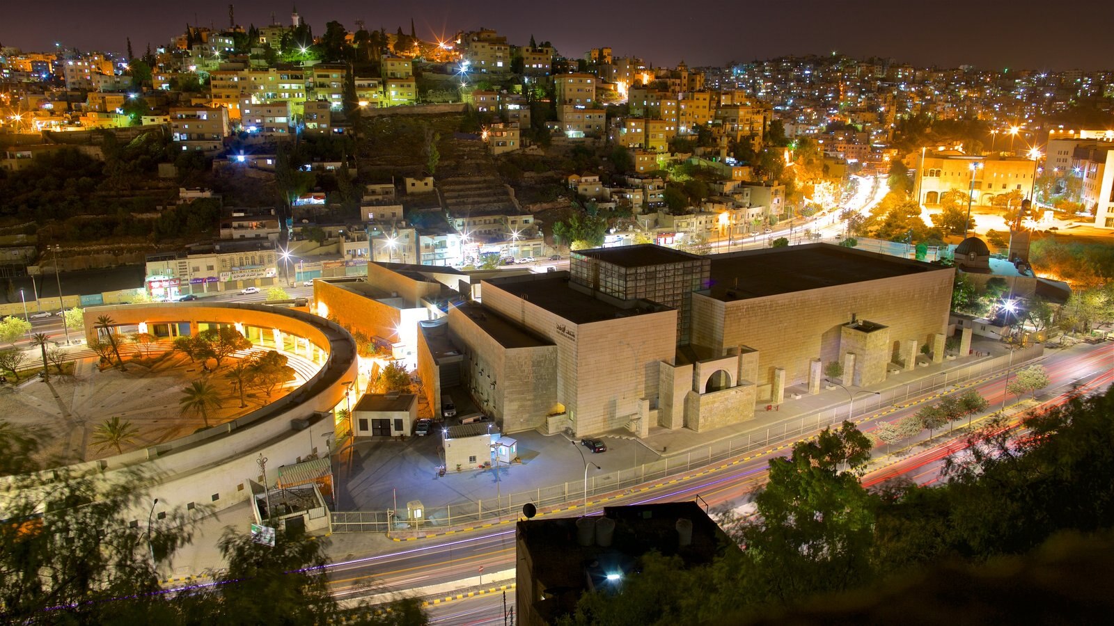 Amman showing a city, night scenes and landscape views