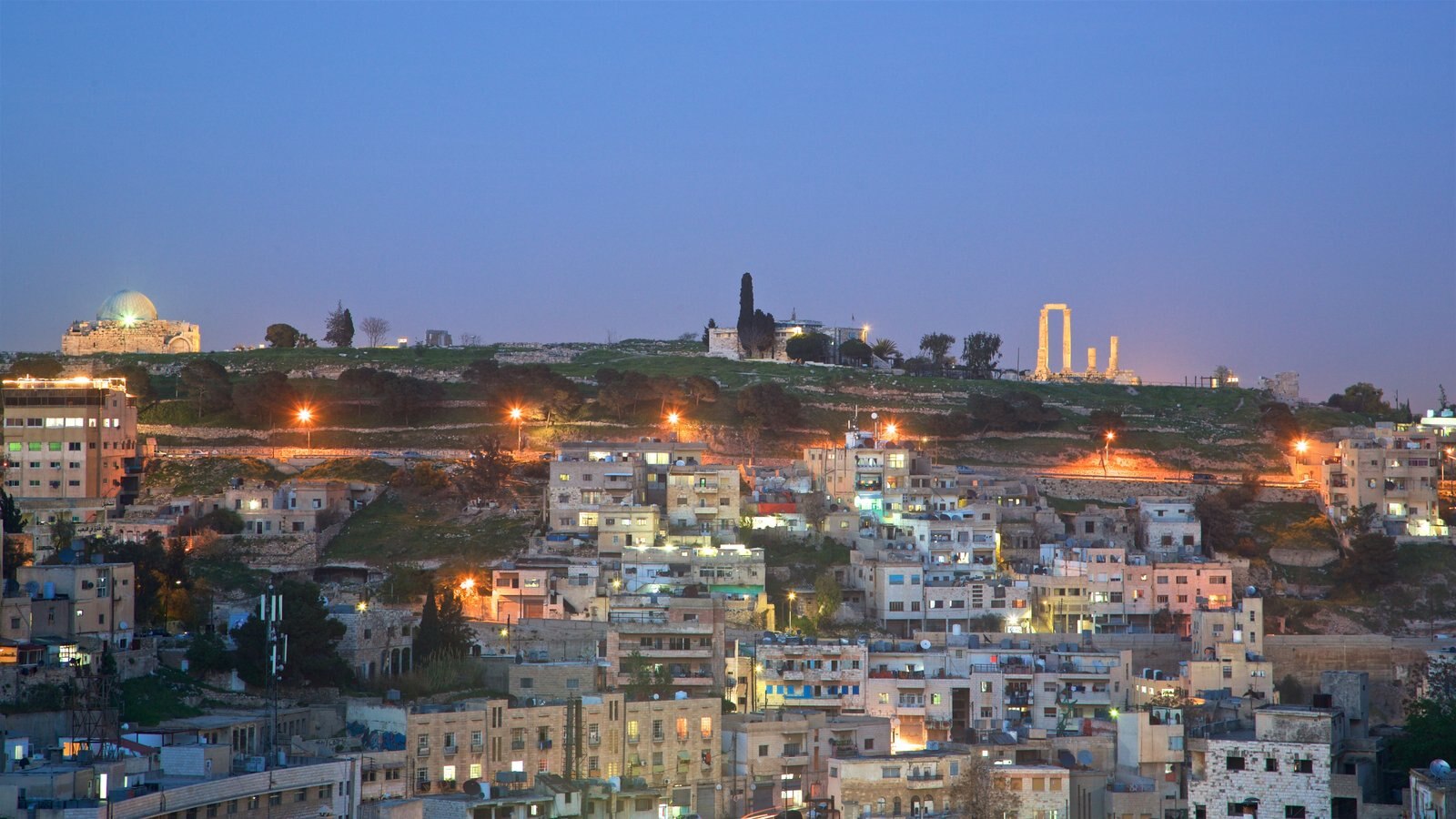 Amman featuring landscape views, night scenes and a city
