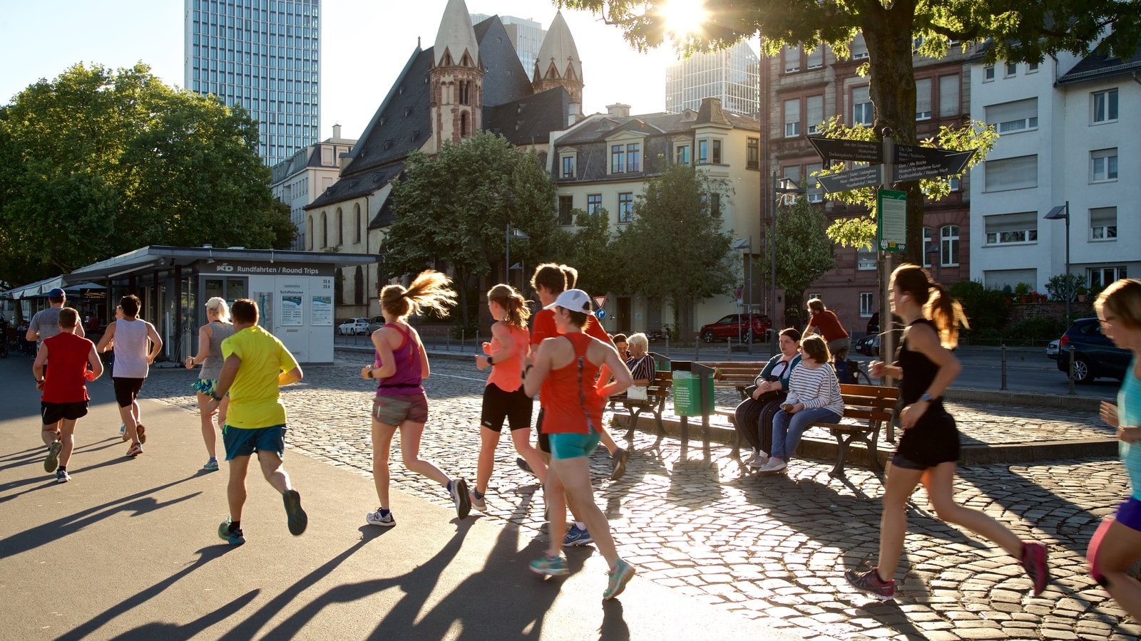 Frankfurt which includes a sunset, hiking or walking and street scenes