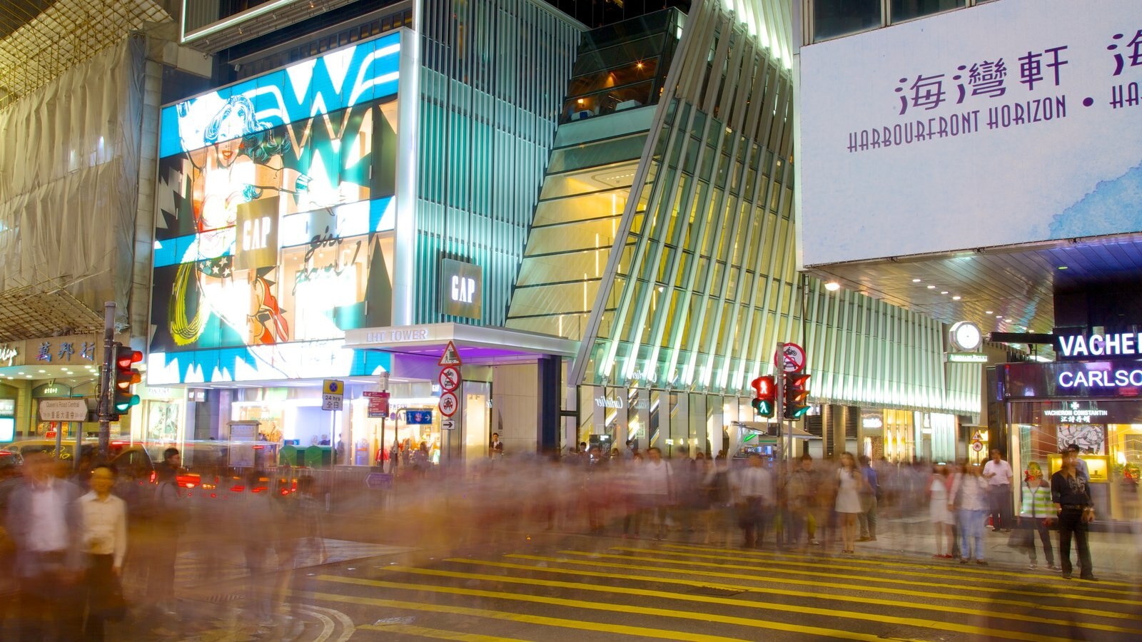 Lan Kwai Fong featuring night scenes, modern architecture and signage