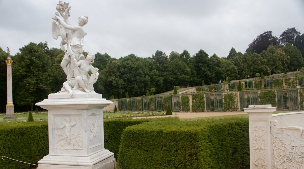 Sanssouci Palace which includes a statue or sculpture and a castle