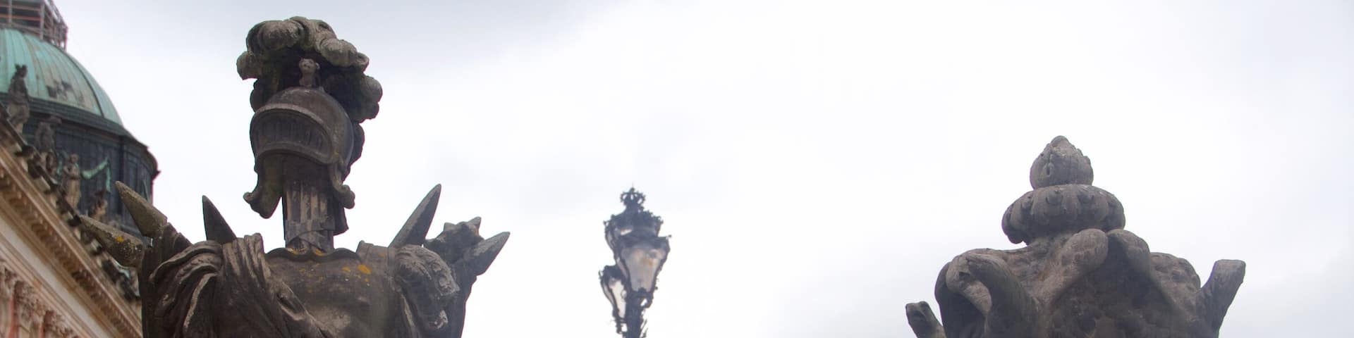 New Palace featuring a castle, heritage architecture and a statue or sculpture