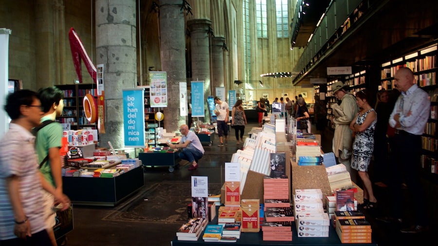 Dominicanenkerk showing shopping and interior views as well as a large group of people